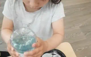 Children playing with bubbles