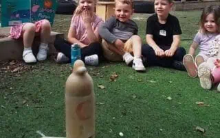 Children playing with coca cola